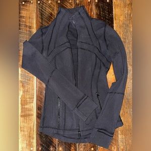 Women’s Lululemon zip-up jacket, size 6, missing a piece on the zipper part